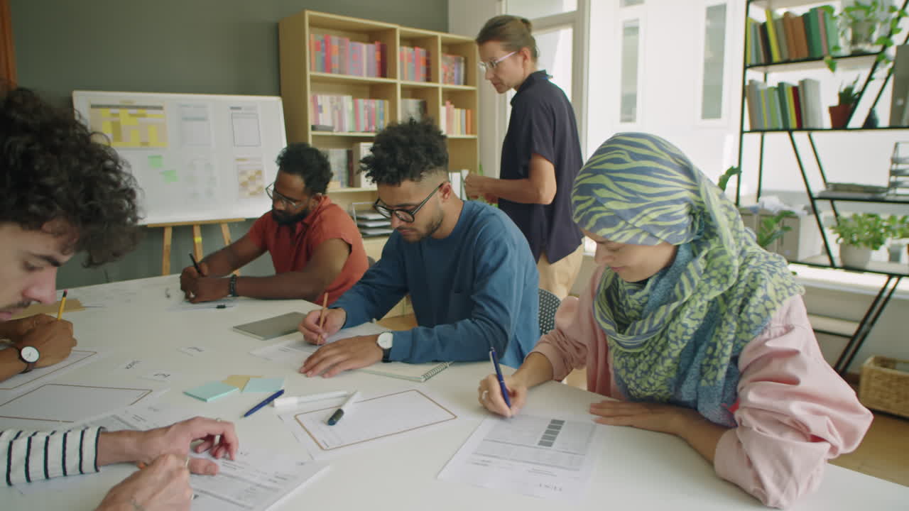 Group of Immigrant Students Having Exam in Language School