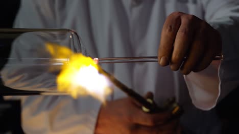 Mid-section-of-male-worker-creating-glass-in-glass-factory-4k