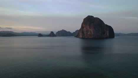 sunset over the islands of bacuit bay, palawan, philippines