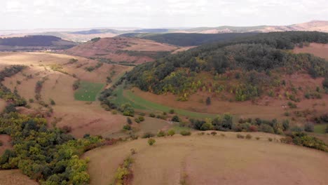 aerial view of rolling hills and valleys