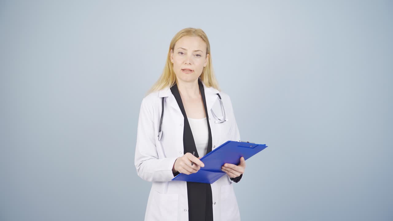 Psychiatrist doctor taking notes.
