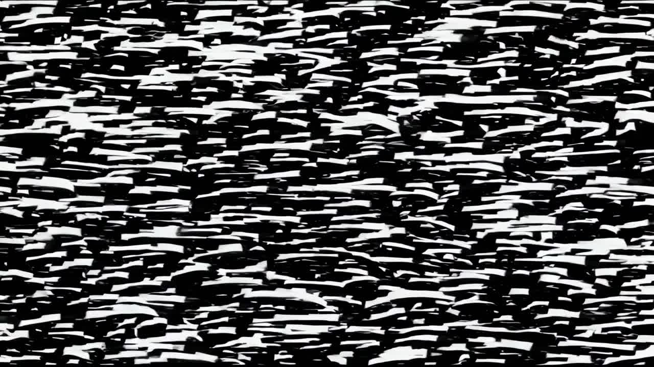 Abstract video concept with a static noise pattern, reminiscent of old TV screens