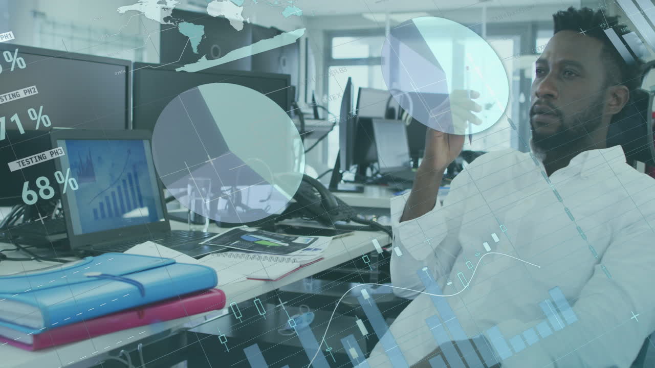 Animation of statistical data processing against thoughtful african american man sitting at office