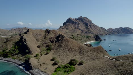 Komodo-aerial-of-the-beach-and-reef-on-a-hot-sunny-day