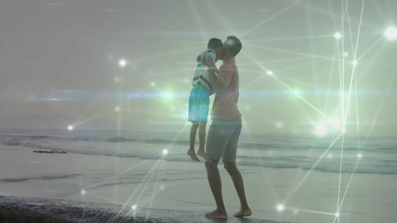 Holding child, father on beach with animation of glowing network connections