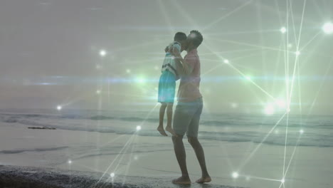 holding child, father on beach with animation of glowing network connections