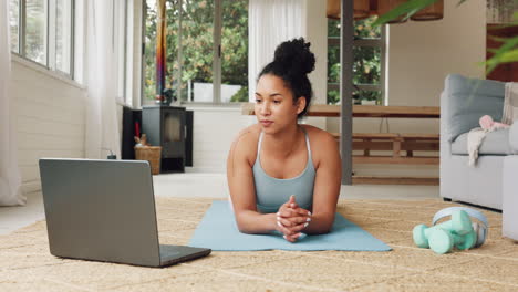 woman doing plank exercise at home