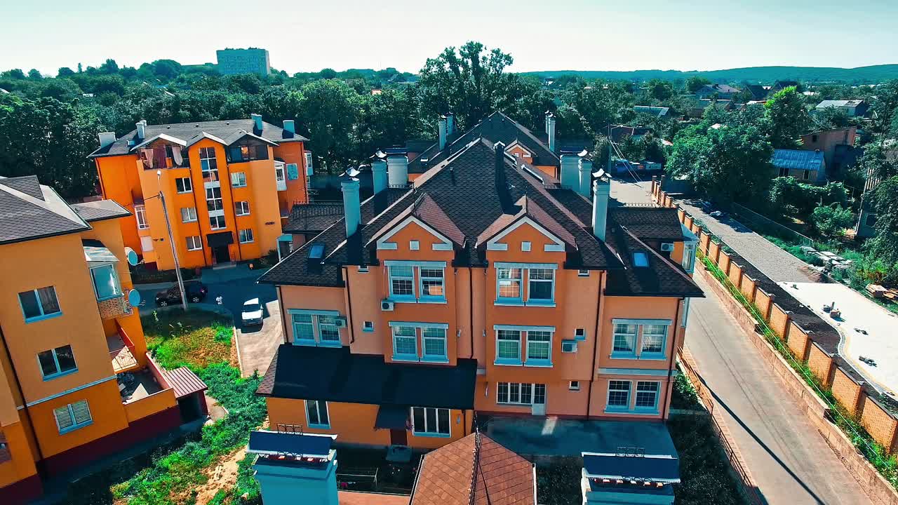 Modern Town Houses On Urban Street. Aerial shot of the modern town houses of brick and glass on urban street