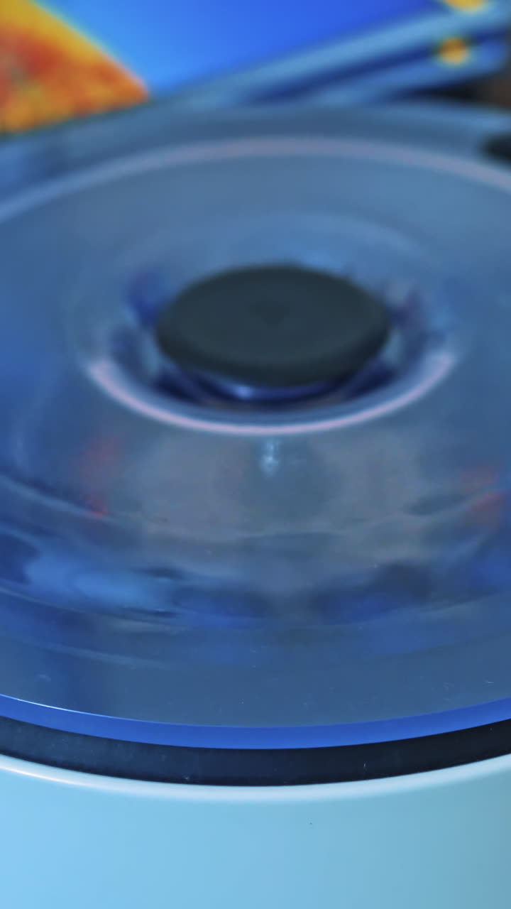 Modern technologies in medical equipment. Medical device centrifuge in process for mixing in the laboratory Vertical video