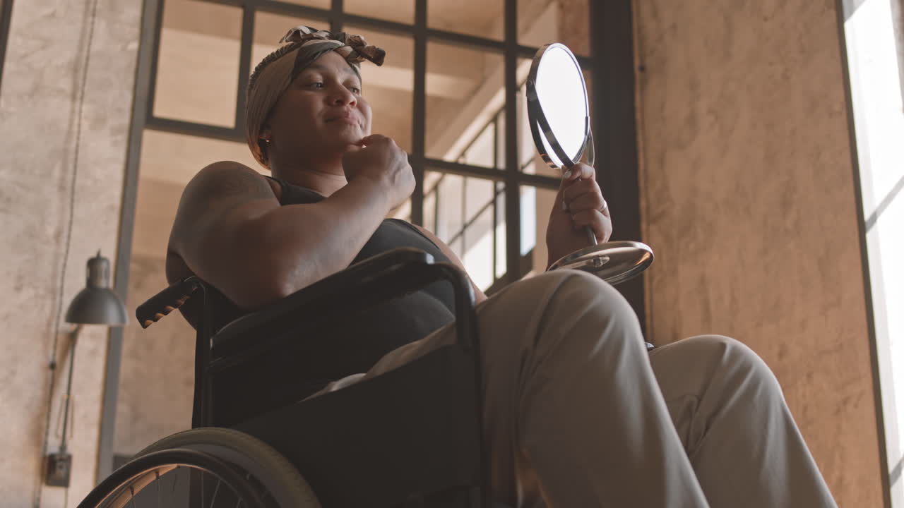 Woman with Disability Looking in Mirror Indoors