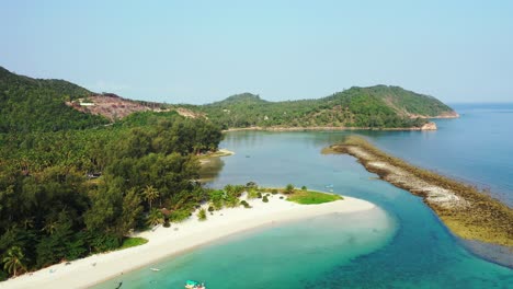 Thailand,-Aerial---low-rounded-hills-on-the-coast-of-the-tropical-island