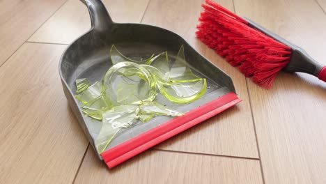 broken glass and cleaning supplies
