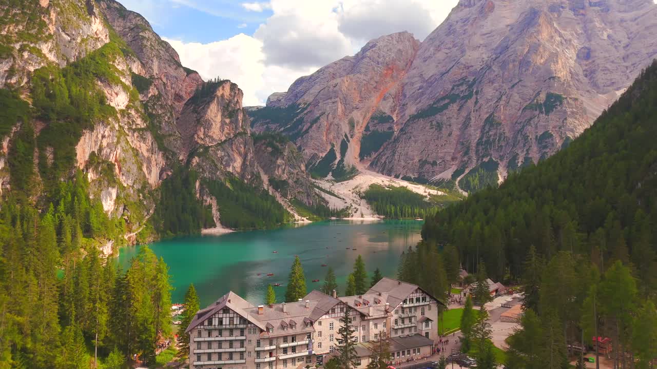 Lake Braies, nestled in the Dolomites, is renowned for its turquoise waters and stunning mountain backdrop, making it a perfect spot for photography and outdoor adventures.