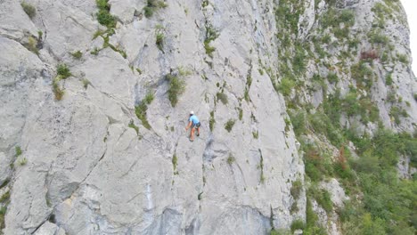 Circular drone footage of a man lead climbing in the Pyrenees moutains at Tarascon sur Ari&egrave;ge