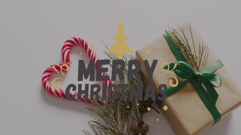 Animation-of-christmas-greetings-text-over-christmas-present-and-decorations