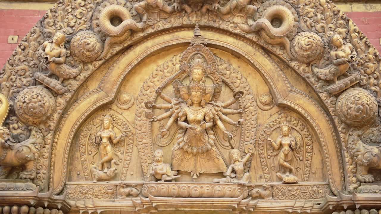 Gold Decoration on Temple Door in Bhaktapur in Nepal, Beautiful Elaborate Intricate and Artistic Decorated Doors in Bhaktapur Ancient City in Nepal, Close Up Detail Shot