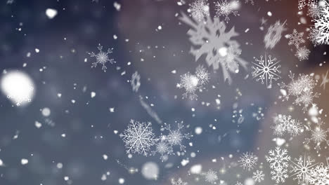 digital animation of snow falling and multiple snowflakes icons on blue background