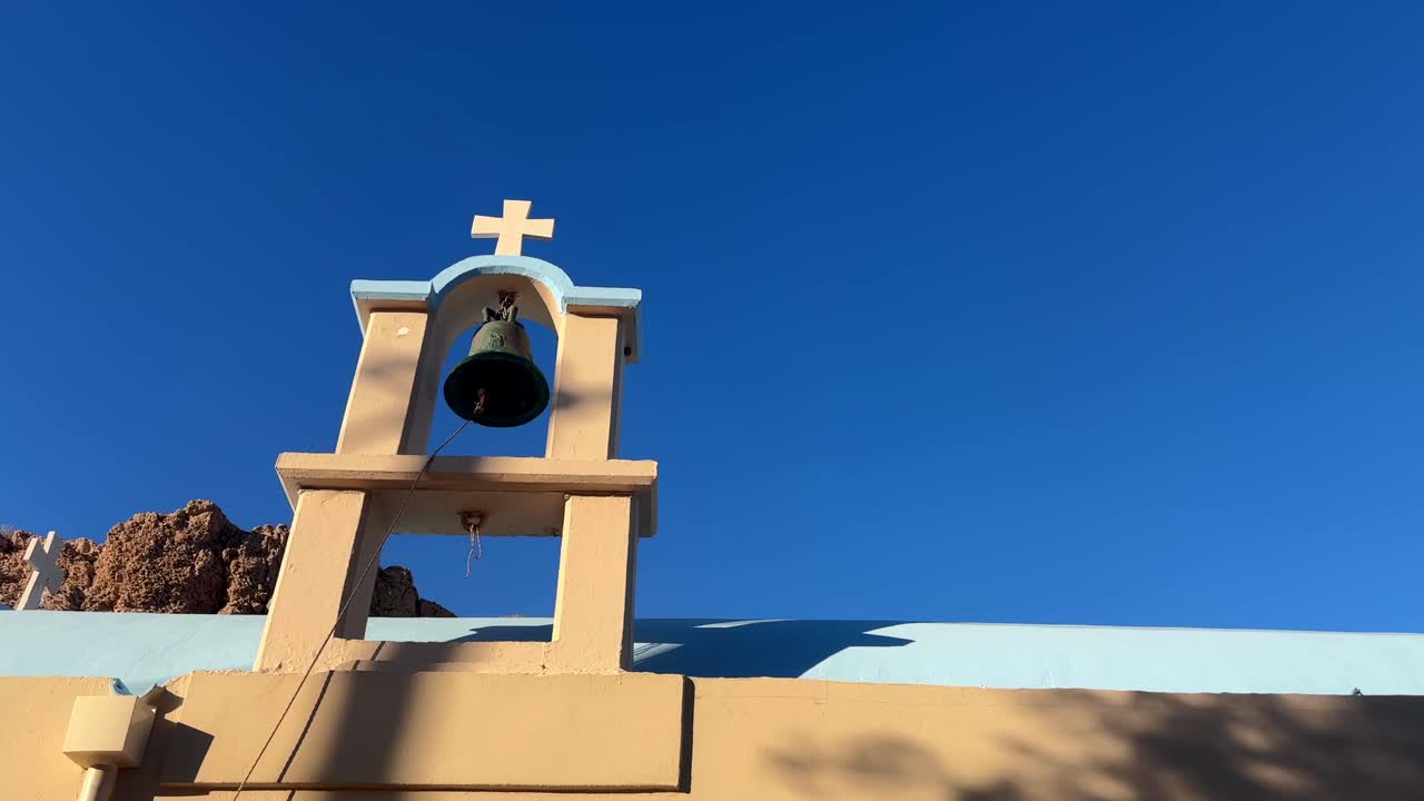 Church Bell Tower Under a Blue Sky