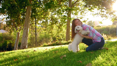 Woman-Hugging-White-Fluffy-Dog-who-Licks-her-Face