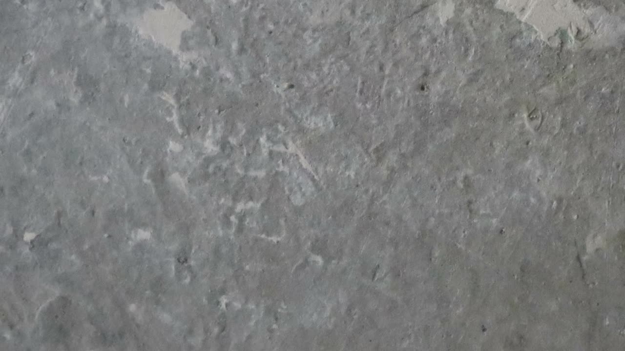 stop motion animación de fondo de textura de hormigón o útil para viejos efectos de películas utilizando la herramienta de opacidad o luma mate