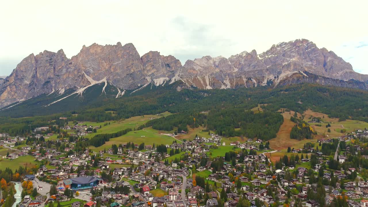 Fly above Cortina d’Ampezzo—where Italian elegance meets snowy adventure.