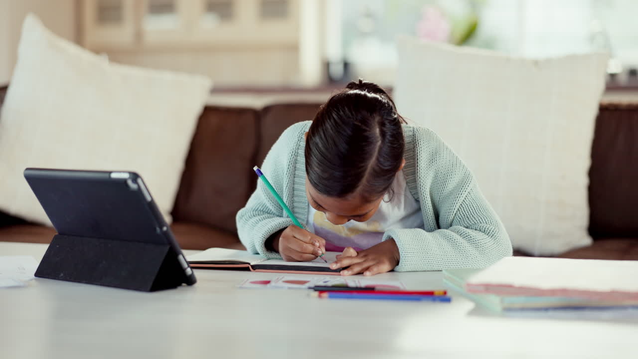 Girl, homework and happy with a tablet