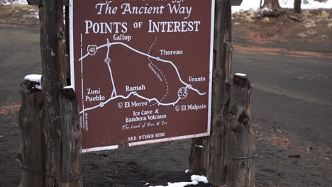 sign and map of scenic route 53, the ancient way point of interest, ice cave and bandera volcano, new mexico usa, tilt up