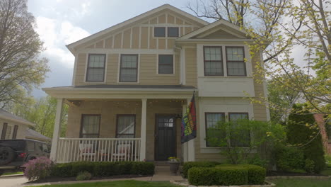 a nice house in the suburbs with a slide to the neighboring house on the right