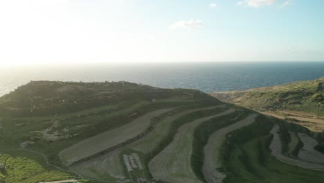 AERIAL:-Reveal-Shot-of-Mediterranean-Sea-with-Plateu-near-Coastline