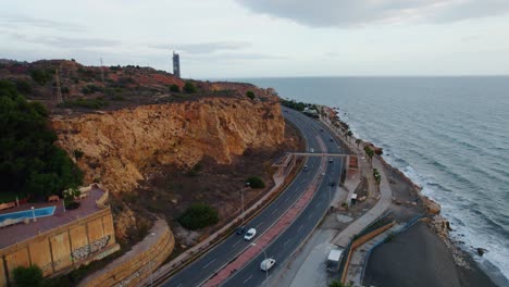 Dron-Cinemático-Delantero-Disparado-Por-Encima-De-La-Carretera-Costera-En-Candado,-Málaga-España