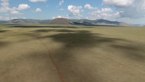 aerial drone shot in endless landscape extinct volcano in mongolia