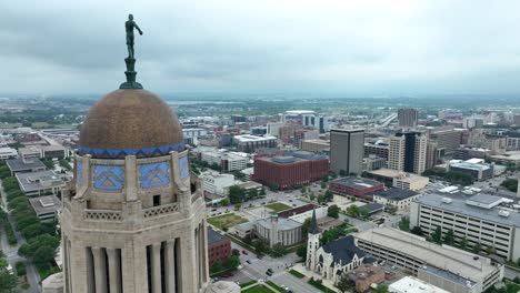 nebraska state capitol building with lincoln skyline