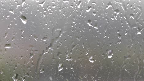 video de 4k de gotas de lluvia en el vidrio de la ventana