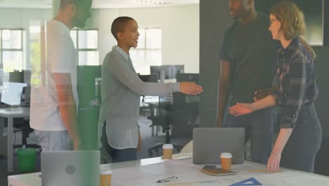 young mixed race business people shaking hands with each other in modern office 4k