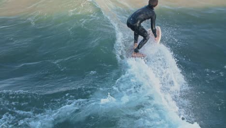 surfer catching a wave