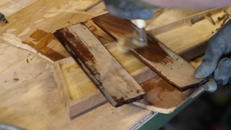 Priming Hardwood Planks with Polyester Resin using a Brush
