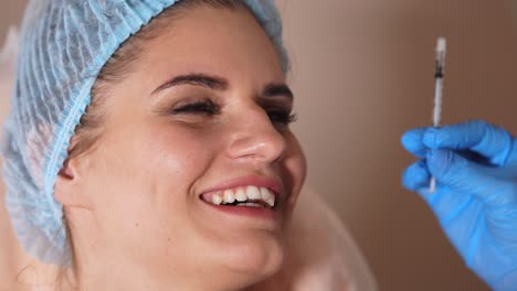Woman receiving facial injection procedure
