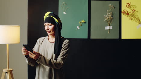 Woman-in-Turban-Using-Smartphone