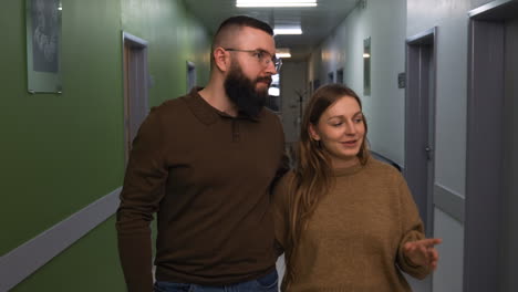 couple walking on a hallway