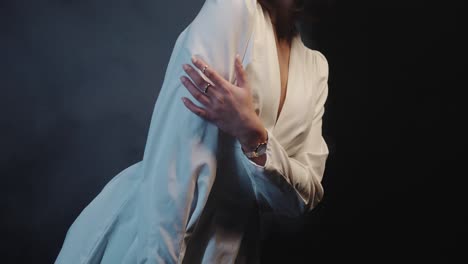 woman in a white outfit in slow motion romantic