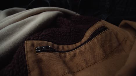 brown coat jacket with unzipped pocket