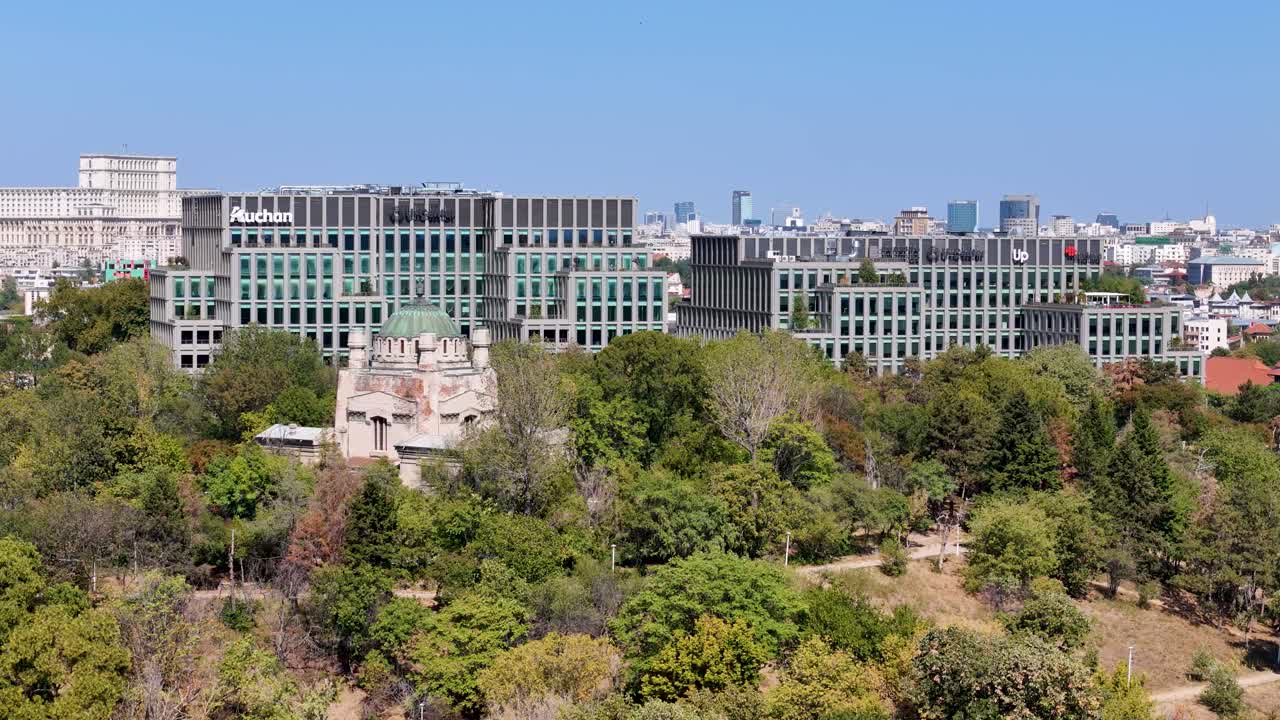 Aerial View of Bucharest Skyline with Modern Office Buildings and Palace of the Parliament
