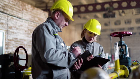 workers with hardhats at the factory