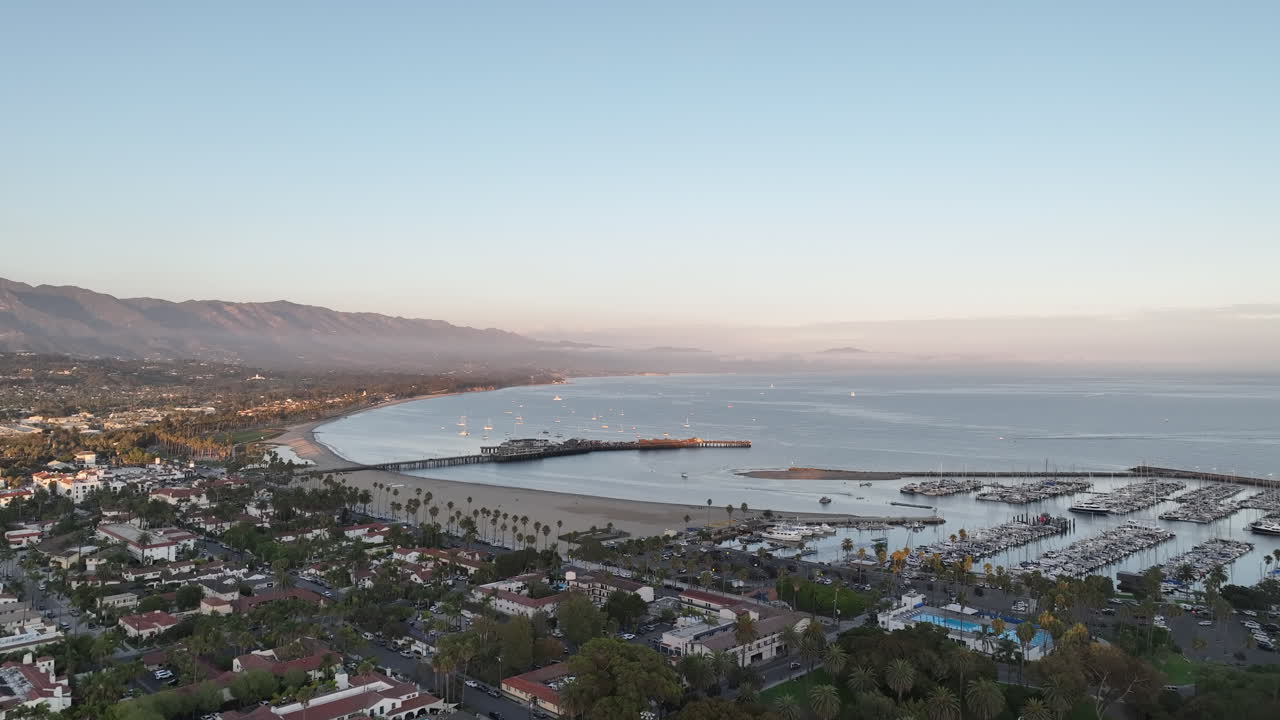 Santa Barbara California drone flight during golden hour. View of the harbor