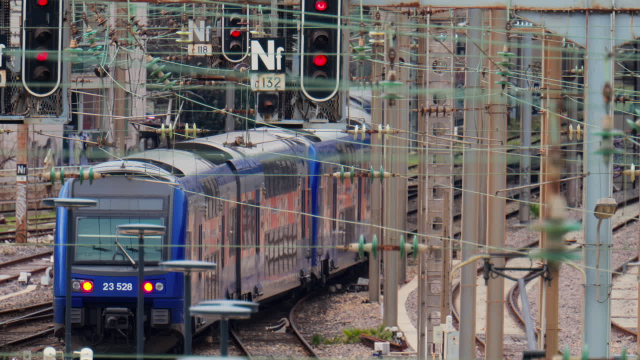 Nice, France - February 4, 2025: Trains moving on the rails in the Nice Ville Central train station