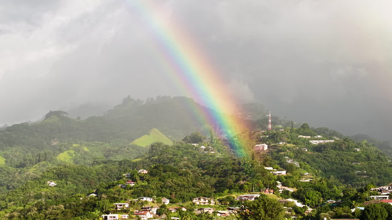 Aerial View of Rainbow Above Hills of Tahiti Island and Papeete, French Polynesia