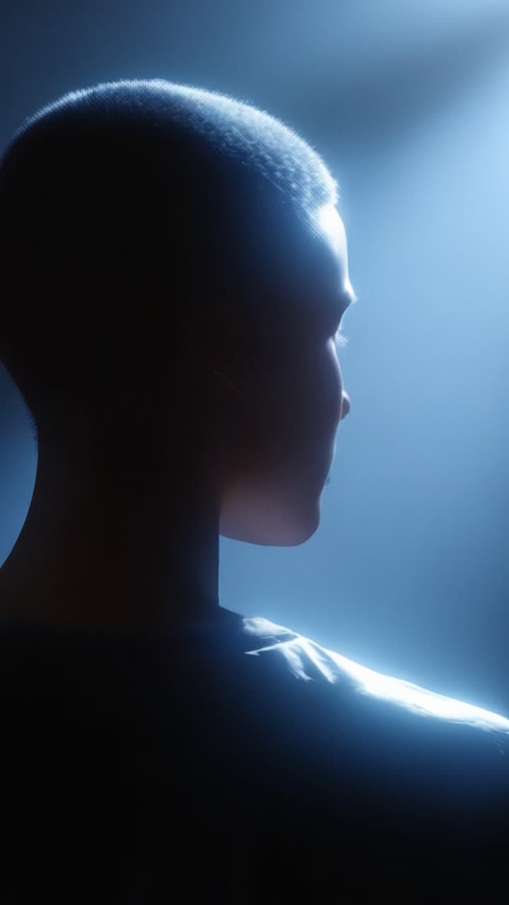A captivating exploration of silhouette and light, capturing the essence of human form in a stunning interplay of shadows and illumination in an artistic setting