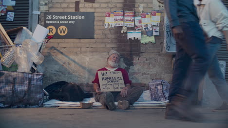 elderly homeless man begging for money on city street