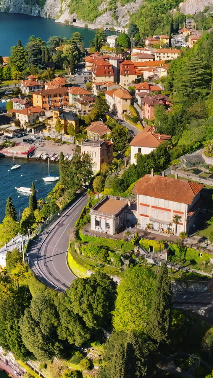 Aerial drone view of Varenna village near Lake Como, Italy. Vertical