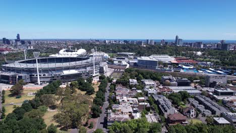 antena baja hacia el campo de cricket de melbourne y el distrito deportivo de australia